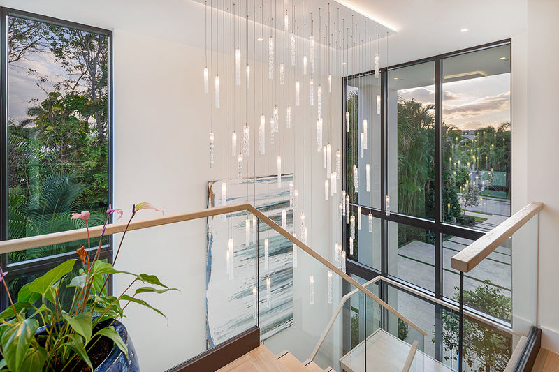 Custom Twist chandelier with an LED canopy in a Delray Beach stairwell